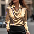Detailed view of the golden satin blouse featuring blue abstract leaf patterns and V-neck - S / Yellow Printed