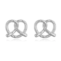 Detailed macro view of silver pretzel heart stud earrings with sparkling pavé zircons - Pretzel Stud Earrings / Silver / White Zirconia