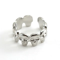 Bague ouverte punk en acier inoxydable argenté avec motifs de crânes connectés - Ouvert Réglable / Couleur Acier