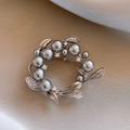 Detailed close-up of wreath brooch with grey pearls and sparkling crystals on silk background - 16# Silver - Grey