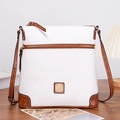 Macro shot of white lychee leather texture and brown edge stitching on crossbody bag - White