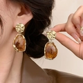 Detailed view of 18K gold plated amber resin earrings with irregular hammered texture - Geometric Irregular Amber (Style 5 Silver Needle)