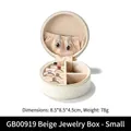 Mini round cream-white PU leather jewelry box organizer with multi-compartment interior - Small / Off White