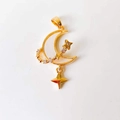 Macro detail of 18k gold moon and star pendant with white shell and inlaid zirconia - Star Moon Tassel*Gold