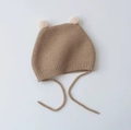 Infant winter knit earflap hat in khaki featuring two cream white faux fur pom poms - Cap circumference 40-48cm, suitable for 3-18 months / Candy Ball Khaki