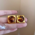 Close-up of vintage square amber resin earrings with a gold-tone metallic frame - 21# Silver Earring Post - Gold - Brown - Square