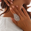 Detail of silver hollow leaf ring on model's finger with elegant textured design - One Size (Adjustable Open) / Silver Tone (0784 Hollow Leaf)