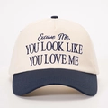 Two-tone baseball cap in beige and navy blue with embroidered quote for outdoor style - One Size / Cream/Navy Blue