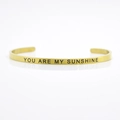 4mm gold stainless steel cuff bracelet engraved with the phrase YOU ARE MY SUNSHINE - VISIONARY