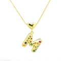Detail of 3D gold balloon letter M pendant with multicolored crystal inlay on heart clasp - Letter-M
