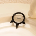 Black G23 titanium 10mm septum ring with three spikes on a beige ceramic surface - 1.6mm*10mm (587) / Black