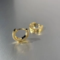 Luxury gold hoop earrings with three-sided crystal pave setting on a brushed grey surface - Double Row Pave / Gold