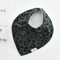 Detail of soft cotton baby bib with dark grey leopard print and snap button closure - Triangle / Dark Green
