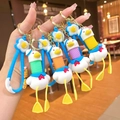 Creatieve intrekbare zeemans eend sleutelhanger met kleurrijke Feel Good riem - Intrekbare Hoedeneend [Wit gemengde stijl]
