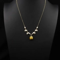 Golden freshwater pearl necklace featuring a delicate yellow dried flower bud pendant - Yellow Rose Pendant Style
