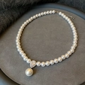 Macro detail of pearl necklace with a sparkling teardrop diamond pendant on velvet - White Pearl Necklace with Water Drop Rhinestone Pendant (Style 16)