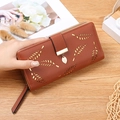 Women long leather wallet in tan brown with hollow leaf design and metal pendant charm - Brown