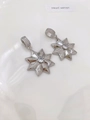Macro detail of silver octagonal star pendants with sparkling pavé cubic zirconia - Style B Octagonal Star (Pendant Only) / White Gold