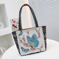 Ethnic canvas tote bag with butterfly embroidery and colorful striped woven handles - Butterfly 2