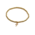 Polished gold beaded bracelet for women featuring a sparkling zircon lightning bolt pendant - Lightning Pendant