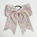 Macro detail of 8-inch sequin bow hair tie with vibrant multicolored glitter pattern - Iridescent White