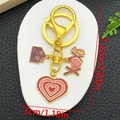 Detail of red enamel heart and XOXO keychain with dimensions 7.2cm by 3cm - Red Glitter Heart Envelope Style (ER1283)