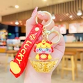 Yellow dragon astronaut keychain with lucky charm and liquid glitter in a gold sycee - Dragon Ingot Quicksand-Gold Foil