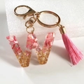 Pink resin letter W keychain with gold flakes, tassel charm and gold lobster clasp - Letter W