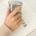 Gold finish stainless steel ring with classic black and white checkerboard pattern - US 7 / Gold