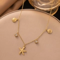 Collier exquis en or avec pendentifs étoile de mer, coquillages et zircon pour femme - Coquille d'Étoile de Mer Zirconia (H1304) Or