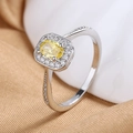 Elegant silver halo ring with oval yellow gemstone and sparkling side micro-pavé diamonds - US 6 / Yellow