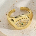 Gold plated evil eye ring with white zircon and green center stone in vintage style - White Zirconia Ring