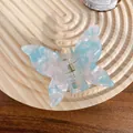 Light blue and white marble pattern butterfly hair claw clip with a glossy acrylic finish - 6.5cm / Dreamy Blue