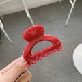 Detail of glossy red butterfly square hair claw clip for high ponytail styling - Red