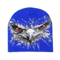 Macro shot of bright blue knitted beanie featuring a detailed eagle head jacquard pattern - Royal Blue
