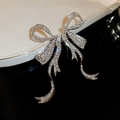 Macro shot of silver bow tassel earrings with micro-paved rhinestones and starry effect - 7# Silver Needle-Silver-Rhinestone Bow