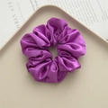 Purple satin silk scrunchie with soft pleated texture on a neutral display tray - Dark Purple