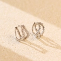 Silver double-row linear hoop earrings with sparkling cubic zirconia on stone background - 925 Silver / White Gold