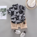 Sommer-Set für Jungen mit schwarzem Hemd mit Palmendruck und Khaki-Shorts - 80cm / Schwarz