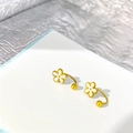 Detailed shot of golden flower stud earrings with white enamel petals and U-shaped pins - U-Shape White Gold Flower (Single)