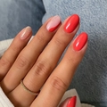Red and sparkly pink oval press-on nails shown on hand with a denim background - Bz1483 Golden Jade Leaf / Jelly Glue + Nail File