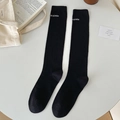 Classic black knee-high knitted socks featuring white 'inaimin' lettering detail - One Size / Black