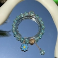 Exquisite beaded bracelet with blue sea glass beads and golden daisy charm detail - S060-blue Daisy Bracelet #sz536