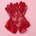 Close-up of elegant red lace gloves featuring delicate floral mesh and ruffled wrist edges - Kids One Size / Red