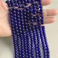 Polished deep royal blue glass beads on an elastic string for DIY jewelry making - Royal Blue Glass Beads
