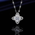 Elegant silver-tone flower necklace pendant with sparkling cubic zirconia on black background - Xl-150 [with Four-leaf Clover Chain]