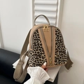 Mini leopard print backpack featuring beige leather trim and adjustable fabric straps - Khaki