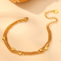 Double-layered gold stainless steel chain bracelet featuring multiple heart charms - Gold Bracelet