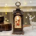 Vintage bronze Christmas lantern with Santa Claus and sparkling gold glitter inside - Gold-brushed Bronze Santa Claus