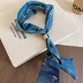 Close-up of blue satin silk scarf necklace with oil painting print and golden ring buckle - Blue Oil Painting